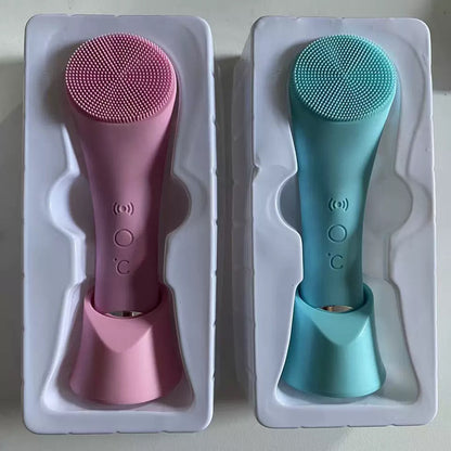 Heated facial cleansing brush