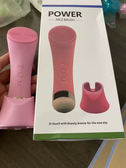 Heated facial cleansing brush